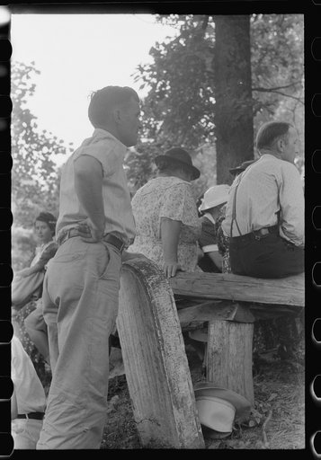 Untitled photo, possibly related to: Preacher, relatives and friends of the deceased at a memorial meeting near Jackson, Breathitt County, Kentucky. See general caption no. 1