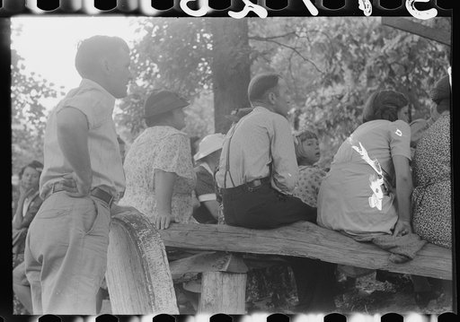 Untitled photo, possibly related to: Preacher, relatives and friends of the deceased at a memorial meeting near Jackson, Breathitt County, Kentucky. See general caption no. 1