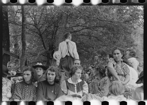 Untitled photo, possibly related to: Preacher, relatives and friends of the deceased at a memorial meeting near Jackson, Breathitt County, Kentucky. See general caption no. 1