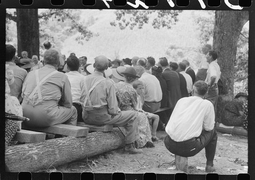 Friends of the deceased's family, at an annual memorial meeting in the family cemetery. In the mountains near Jackson, Kentucky. See general caption no. 1