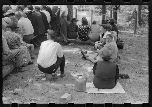 Friends of the deceased's family, at an annual memorial meeting in the family cemetery. In the mountains near Jackson, Kentucky. See general caption no. 1