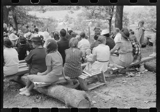 Friends of the deceased's family, at an annual memorial meeting in the family cemetery. In the mountains near Jackson, Kentucky. See general caption no. 1