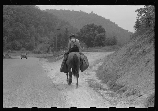 Untitled photo, possibly related to: Rural postman who delivers mail to the mountain families up the side roads and creek beds. Near Jackson, Kentucky