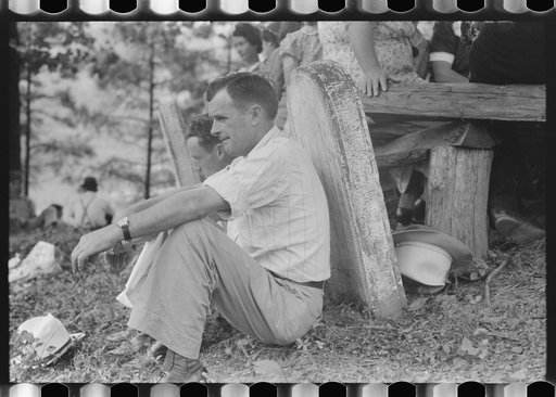 Friends of the deceased's family, at an annual memorial meeting in the family cemetery. In the mountains near Jackson, Kentucky. See general caption no. 1