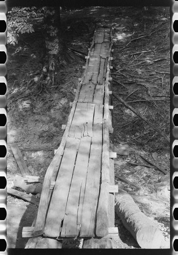 Untitled photo, possibly related to: Detail of bridge over creek made by mountaineer near Jackson, Kentucky