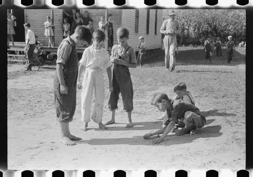 Mountain children playing marbles after school in Breathitt County, Kentucky