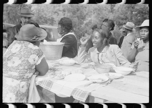 Outdoor picnic during the noon intermission of an all-day ministers and deacons meeting. Near Yanceyville, Caswell County, North Carolina