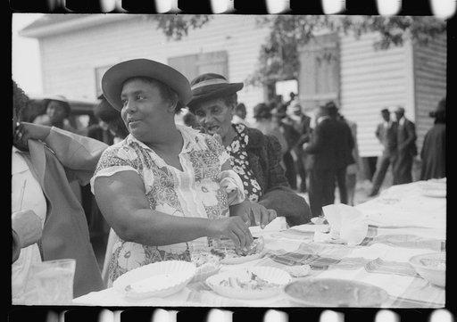 Outdoor picnic during the noon intermission of an all-day ministers and deacons meeting. Near Yanceyville, Caswell County, North Carolina