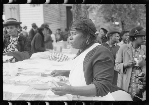Outdoor picnic during the noon intermission of an all-day ministers and deacons meeting. Near Yanceyville, Caswell County, North Carolina