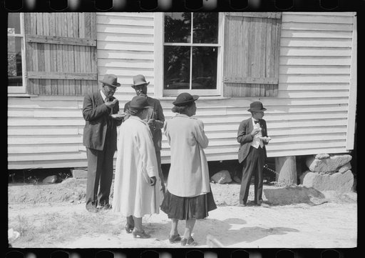 Outdoor picnic during the noon intermission of an all-day ministers and deacons meeting. Near Yanceyville, Caswell County, North Carolina