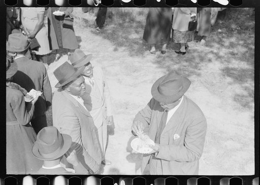 Outdoor picnic during the noon intermission of an all-day ministers and deacons meeting. Near Yanceyville, Caswell County, North Carolina