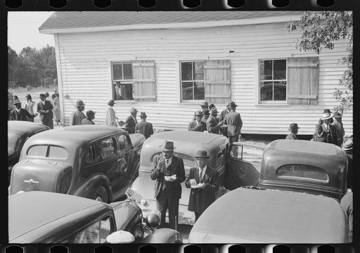 Outdoor picnic during the noon intermission of an all-day ministers and deacons meeting. Near Yanceyville, Caswell County, North Carolina