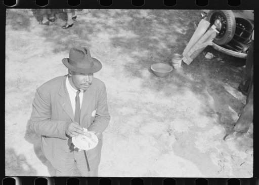 Outdoor picnic during the noon intermission of an all-day ministers and deacons meeting. Near Yanceyville, Caswell County, North Carolina