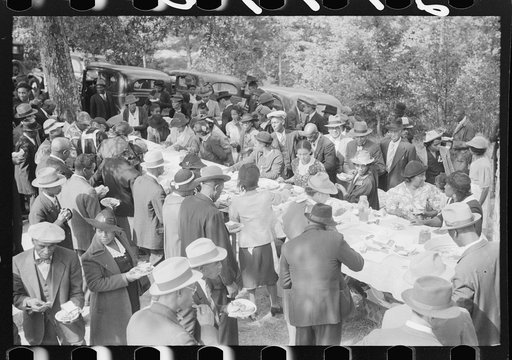 Untitled photo, possibly related to: Outdoor picnic during the noon intermission of an all-day ministers and deacons meeting. Near Yanceyville, Caswell County, North Carolina