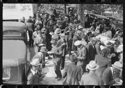 Untitled photo, possibly related to: Outdoor picnic during the noon intermission of an all-day ministers and deacons meeting. Near Yanceyville, Caswell County, North Carolina