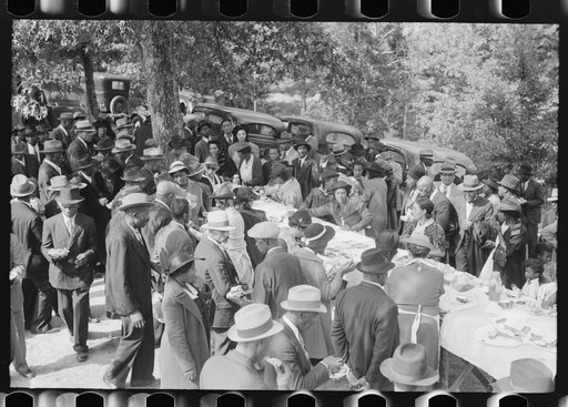 Outdoor picnic during the noon intermission of an all-day ministers and deacons meeting. Near Yanceyville, Caswell County, North Carolina