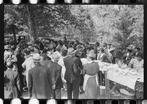 Untitled photo, possibly related to: Outdoor picnic during the noon intermission of an all-day ministers and deacons meeting. Near Yanceyville, Caswell County, North Carolina