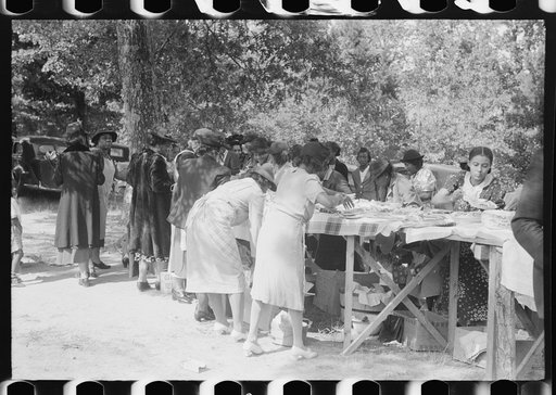 Untitled photo, possibly related to: Outdoor picnic during the noon intermission of an all-day ministers and deacons meeting. Near Yanceyville, Caswell County, North Carolina