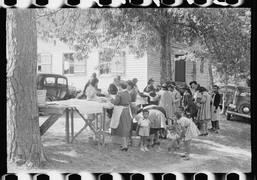 Outdoor picnic during the noon intermission of an all-day ministers and deacons meeting. Near Yanceyville, Caswell County, North Carolina