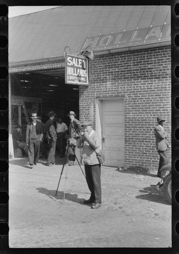Untitled photo, possibly related to: Taking a load of tobacco into the warehouse for the auction sale. Danville, Virginia