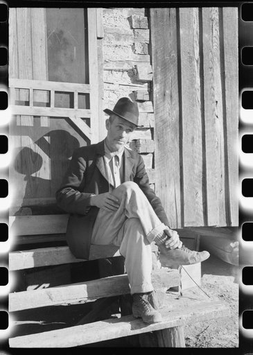 Untitled photo, possibly related to: Noah Garland sitting on the steps of his son's home, Southern Appalachian Project, near Barbourville, Knox County, Kentucky