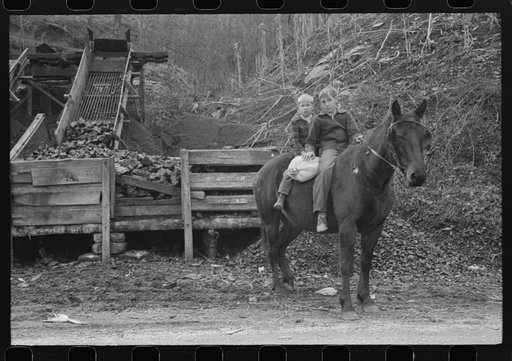 FSA (Farm Security Administration) borrower's children returning home on muleback with a sack of meal. Knox County, Kentucky