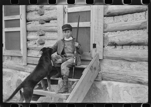 Untitled photo, possibly related to: FSA (Farm Security Administration) borrower's son who had just returned from hunting. Knox County, Kentucky