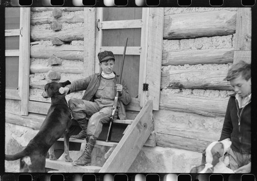 Untitled photo, possibly related to: FSA (Farm Security Administration) borrower's son and his friend. They had just returned from hunting. Knox County, Kentucky