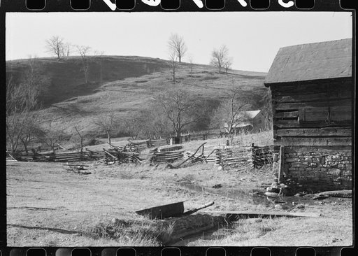 Untitled photo, possibly related to: Rail fence and farmhome. Near Luray, Virginia