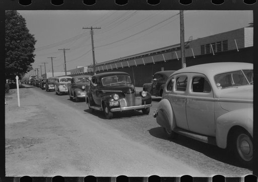 Untitled photo, possibly related to: Congestion outside Pratt and Whitney United aircraft plant at afternoon change of shift. East Hartford, Connecticut