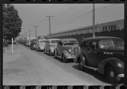Congestion outside Pratt and Whitney United aircraft plant at afternoon change of shift. East Hartford, Connecticut