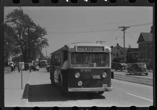 Untitled photo, possibly related to: Buses which take many workers home in front of United Aircraft, Pratt and Whitney plant, East Hartford Connecticut
