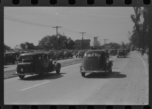 Untitled photo, possibly related to: Buses which take many workers home in front of United Aircraft, Pratt and Whitney plant, East Hartford Connecticut