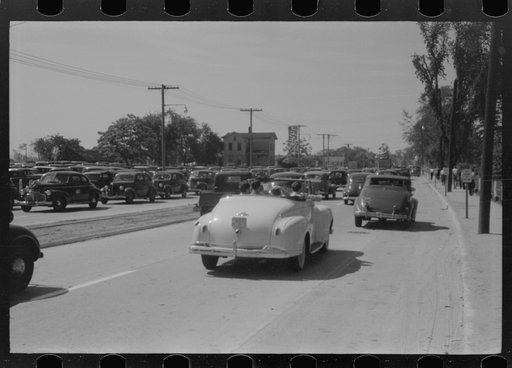 Untitled photo, possibly related to: Buses which take many workers home in front of United Aircraft, Pratt and Whitney plant, East Hartford Connecticut