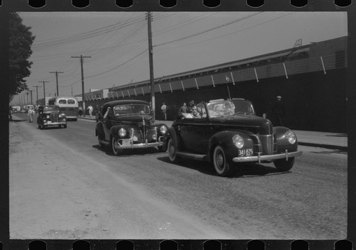 Untitled photo, possibly related to: East Hartford, Connecticut. Congestion outside the Pratt and Whitney United aircraft plant at the afternoon change of shift