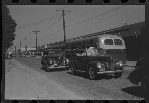 Untitled photo, possibly related to: East Hartford, Connecticut. Congestion outside the Pratt and Whitney United aircraft plant at the afternoon change of shift