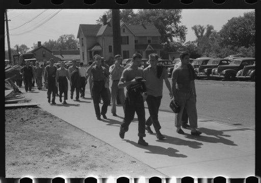 Untitled photo, possibly related to: Workers entering plant at afternoon change of shift. Pratt and Whitney plant, United Aircraft, East Hartford, Connecticut