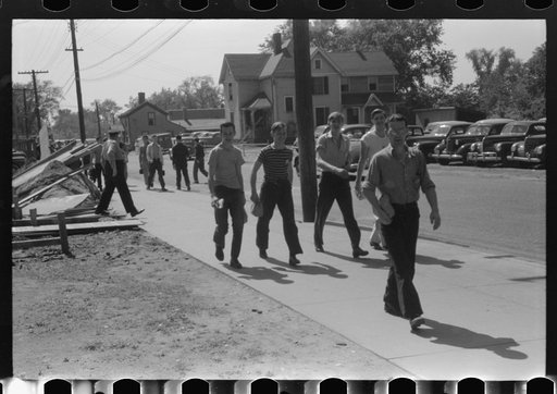 Untitled photo, possibly related to: Workers entering plant at afternoon change of shift. Pratt and Whitney plant, United Aircraft, East Hartford, Connecticut