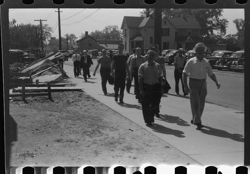 Untitled photo, possibly related to: Workers entering plant at afternoon change of shift. Pratt and Whitney plant, United Aircraft, East Hartford, Connecticut