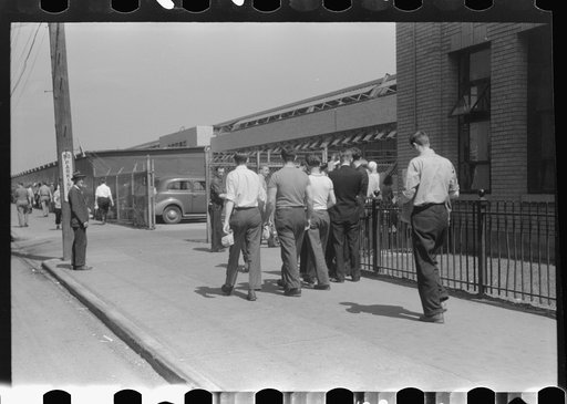 Untitled photo, possibly related to: Workers entering plant at afternoon change of shift. Pratt and Whitney plant, United Aircraft, East Hartford, Connecticut
