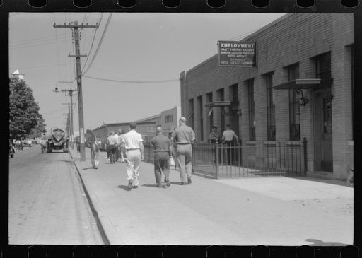Untitled photo, possibly related to: Workers entering plant at afternoon change of shift. Pratt and Whitney plant, United Aircraft, East Hartford, Connecticut