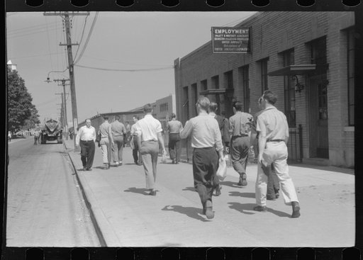 Untitled photo, possibly related to: Workers entering plant at afternoon change of shift. Pratt and Whitney plant, United Aircraft, East Hartford, Connecticut