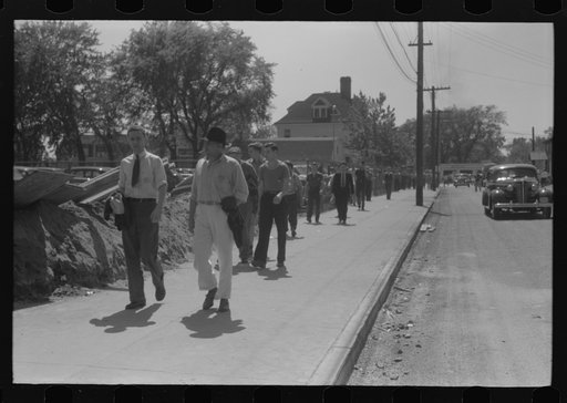 Untitled photo, possibly related to: Workers entering plant at afternoon change of shift. Pratt and Whitney plant, United Aircraft, East Hartford, Connecticut