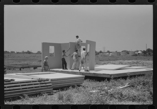 Untitled photo, possibly related to: Prefabricated defense housing under contruction, near airport. Hartford, Connecticut. Constructed and managed by FSA (Farm Security Administration)