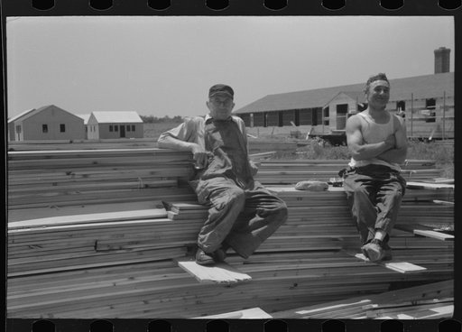 Workers during lunch hour putting up prefabricated defense houses managed by FSA (Farm Security Administration), Hartford, Connecticut
