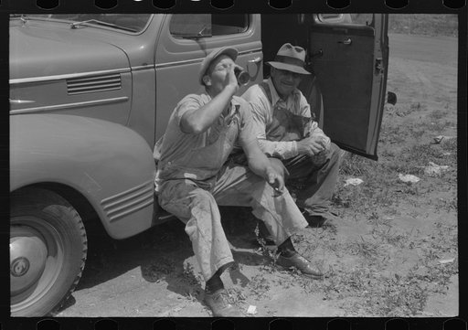 Workers during lunch hour putting up prefabricated defense houses managed by FSA (Farm Security Administration), Hartford, Connecticut