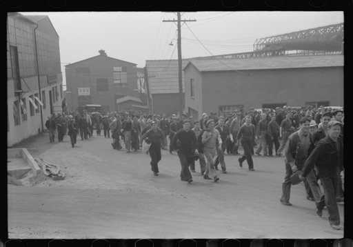 Untitled photo, possibly related to: Workers leaving plant at change of shift before being paid off. Electric Boat Works, Groton, Connecticut