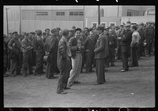 Workers leaving plant at change of shift before being paid off. Electric Boat Works, Groton, Connecticut