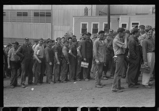 Workers leaving plant at change of shift before being paid off. Electric Boat Works, Groton, Connecticut