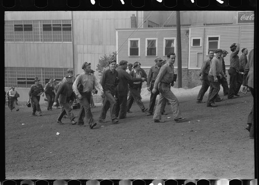 Workers leaving plant at change of shift before being paid off. Electric Boat Works, Groton, Connecticut